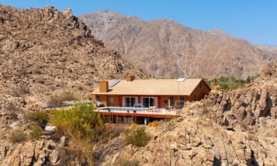 A Rock and a Cool Space: California House Tucked Between Two Mountains Is On hand for $3.5M