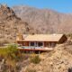 A Rock and a Cool Space: California House Tucked Between Two Mountains Is On hand for $3.5M