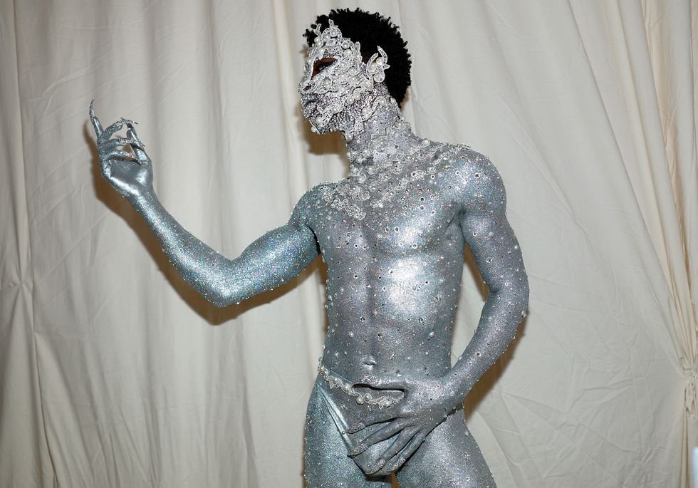 Lil Nas X Showed Up to the Met Gala in Nothing But a Steel Thong, Silver Body Paint, and Jewels