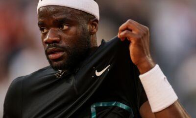 Tiafoe claims maiden grass court title and moves into high 10