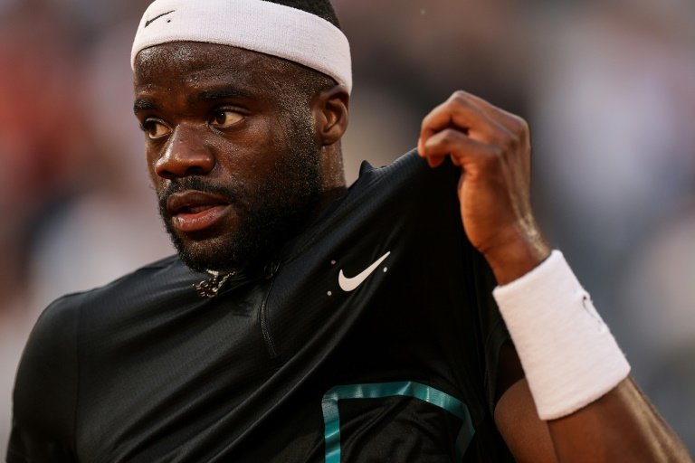 Tiafoe claims maiden grass court title and moves into high 10