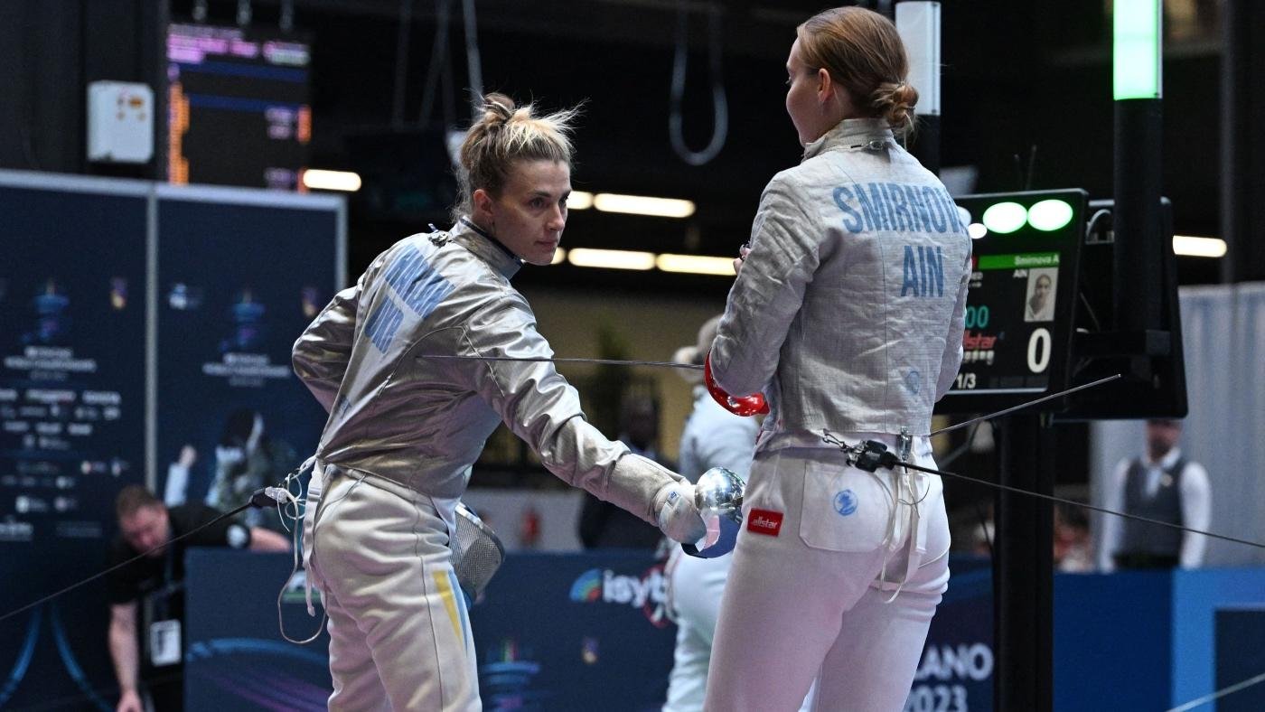 Ukrainian fencer Olga Kharlan disqualified after refusing to shake hands with Russian opponent