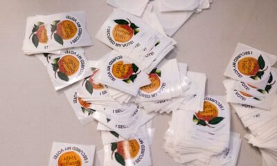 230809153656-01-georgia-votes-peach-stickers-2022