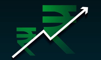 why-is-indias-rupee-at-rs-92-despite-stable-growth-and-manageable-inflation A key driver has been sustained foreign portfolio outflows. Over the past year, global investors have withdrawn billions of dollars from Indian equity and debt markets, a trend that has extended into early 2026. Higher returns on US assets, elevated bond yields, and persistent global risk aversion have made dollar-denominated investments more attractive. As foreign investors sell Indian assets, demand for dollars rises, placing direct downward pressure on the rupee. Exporter behaviour has further compounded the stress. Many exporters are delaying the conversion of their dollar earnings, anticipating additional rupee weakness. This has reduced the near-term supply of dollars in domestic markets. At the same time, steady importer demand—particularly for crude oil and capital goods—continues to support dollar demand, widening the demand–supply imbalance. What stands out in this episode is that the rupee has weakened even as the US dollar has softened against several major global currencies. While many emerging market currencies performed relatively better in 2025, the rupee still depreciated by nearly 5%. This divergence underscores the outsized role of India-specific capital flows rather than broad-based dollar strength. The Reserve Bank of India (RBI) has adopted a measured stance. Despite holding substantial foreign exchange reserves, the central bank has refrained from defending any particular exchange rate level. Its focus appears to be on smoothing volatility rather than preventing gradual depreciation. Market participants expect the RBI to step in decisively only if currency movements become disorderly or pose risks to financial stability. Crucially, the rupee’s decline does not point to a weakening of India’s economic fundamentals. GDP growth remains resilient, inflation is relatively well managed compared with global peers, and there are no immediate signs of structural stress. Economists view the depreciation as part of a broader global reallocation of capital rather than a loss of confidence in India’s economy. Looking ahead, several external factors could influence the rupee’s path. Progress on a long-pending US–India trade agreement, easing global interest rates, or a turnaround in foreign investment flows could support a recovery. Some analysts believe the rupee could strengthen back below the ₹90 mark if global conditions turn favourable. Until then, the currency is likely to remain under pressure, driven more by global capital flows and cautious central bank management than by domestic economic weakness.